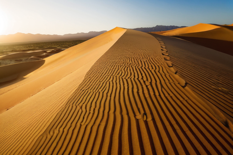 Offroad vehicle on desert sand dunes